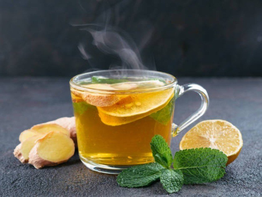 Warm lemon water in glass with morning sunlight – Ayurvedic morning ritual