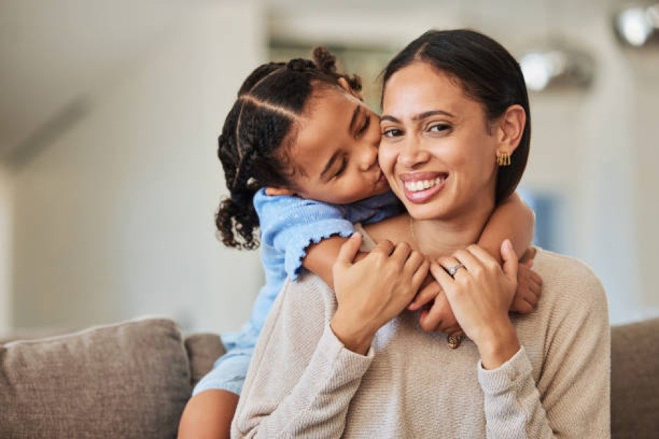 Happy mom and kid, symbolizing holistic