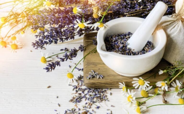 A calming arrangement of stress-relief herbs including chamomile and lavender on a rustic wooden surface.