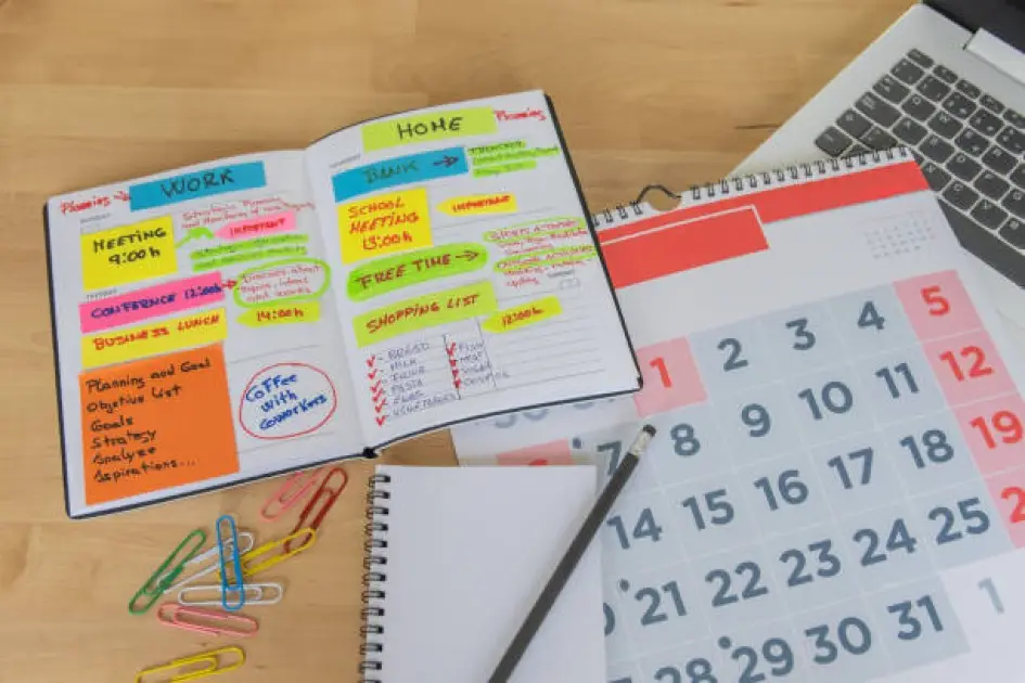 Image of a well-organized journal with a time-blocking schedule for a journaling routine.