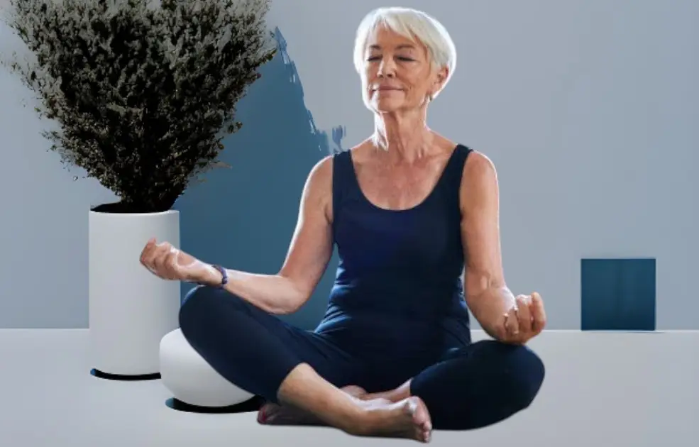 Person meditating in sunrise light, symbolizing calm, strength, and holistic recovery.