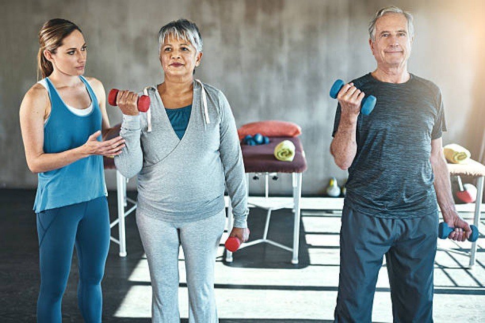 Senior doing a joint-friendly workout, focusing on mobility and strength exercises.