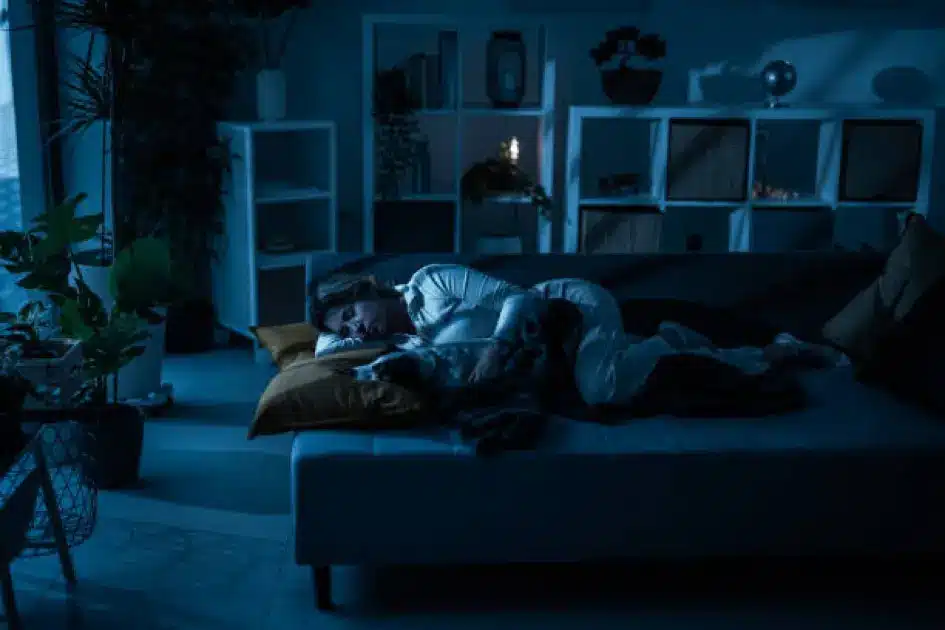 Sleeping person with disrupted metabolic symbols floating around, symbolizing hidden weight gain triggers