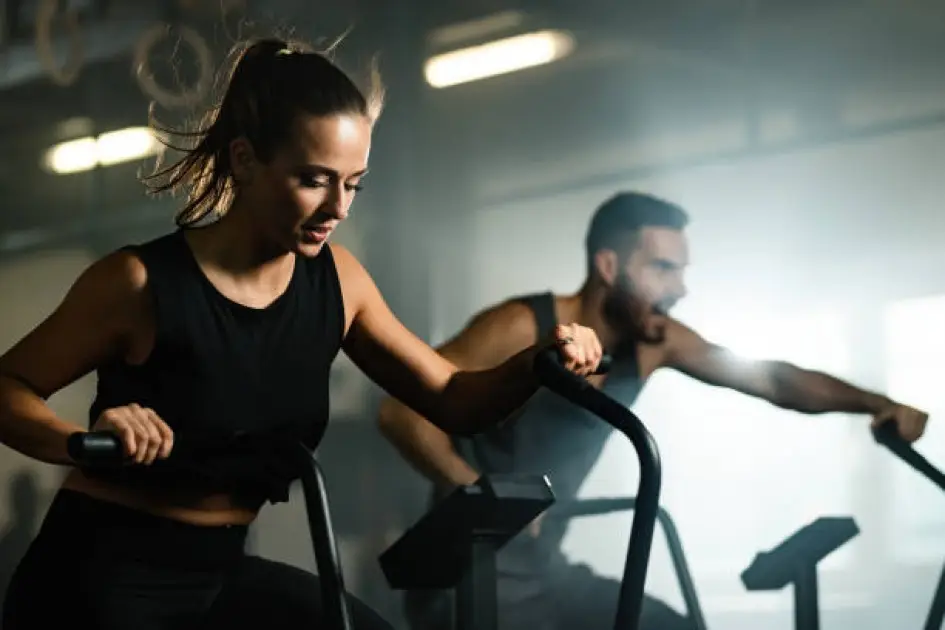 Runner switching between treadmill, track, and outdoor trail for a varied cardio routine.