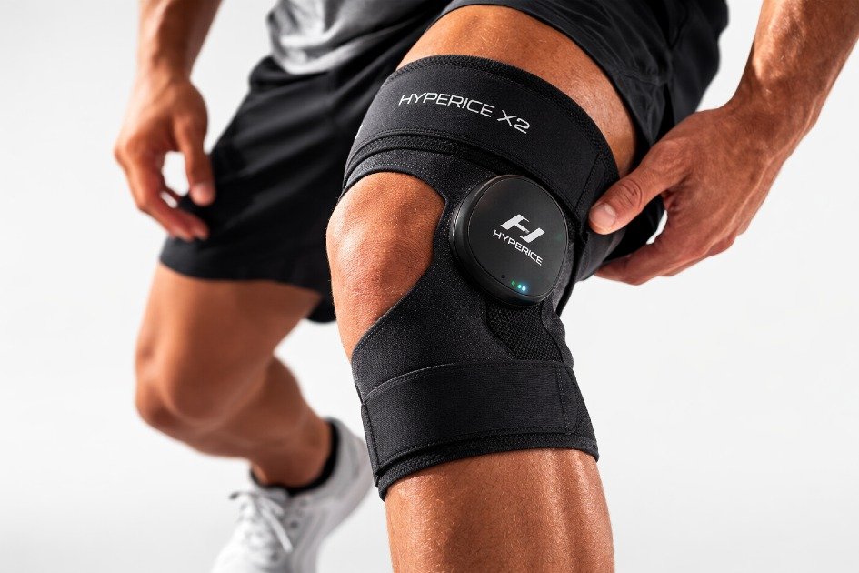 Hyperice X2 knee device on active user
