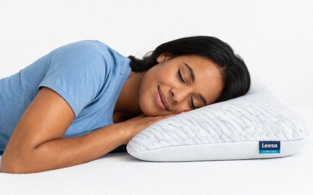 Person peacefully sleeping on Leesa Ultra Cool Memory Foam Pillow