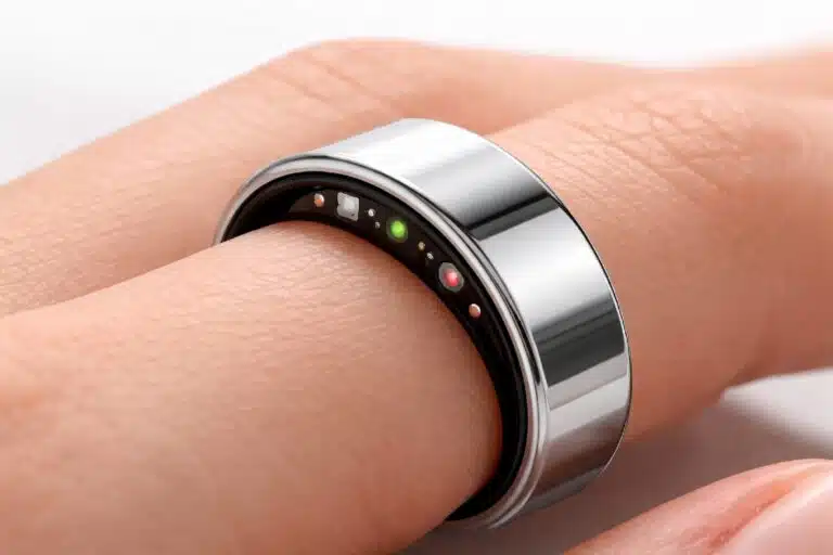 Close-up of Oura Ring 4 smart ring on a finger showing sleek design and health tracking features.