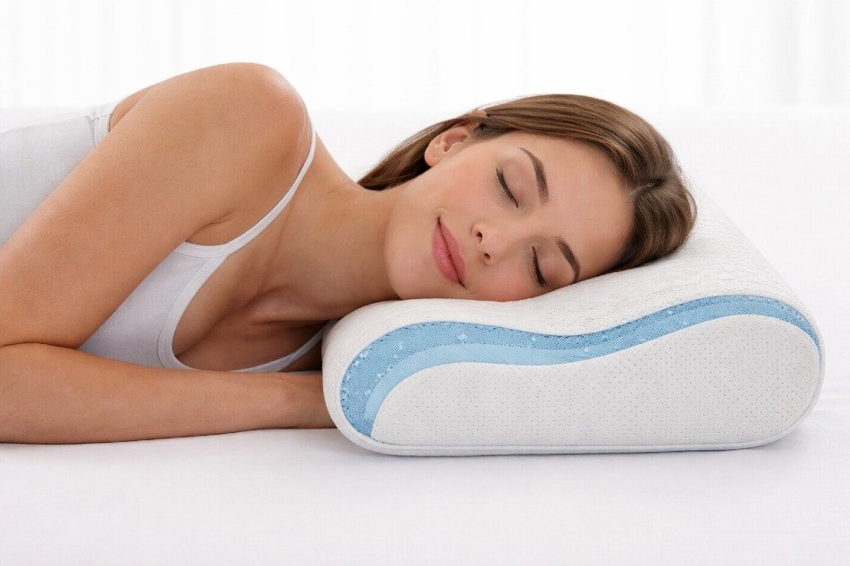Person sleeping on side using Technogel Contour Pillow for neck and spine support