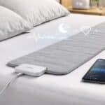 Withings Sleep Tracking Mat on a bedroom mattress monitoring sleep patterns