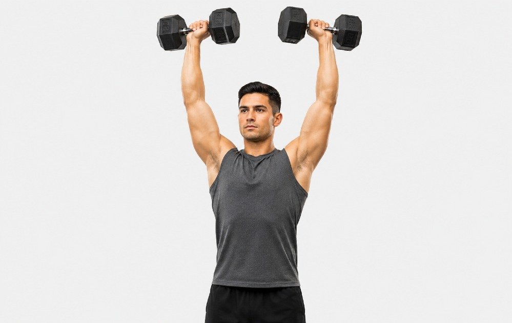 Person performing an overhead press with dumbbells to build shoulder strength and improve upper-body stability.